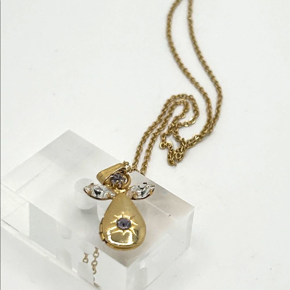 Vintage gold tone angel pendant locket birthstone necklace - purple rhinestone